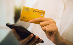 What are some of the common marketing tactics credit card companies use to market to young adults